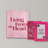 Bundle: pink La Palma & El Tucán T-shirt folded, back print Living From The Heart, with the playing cards box and the King card