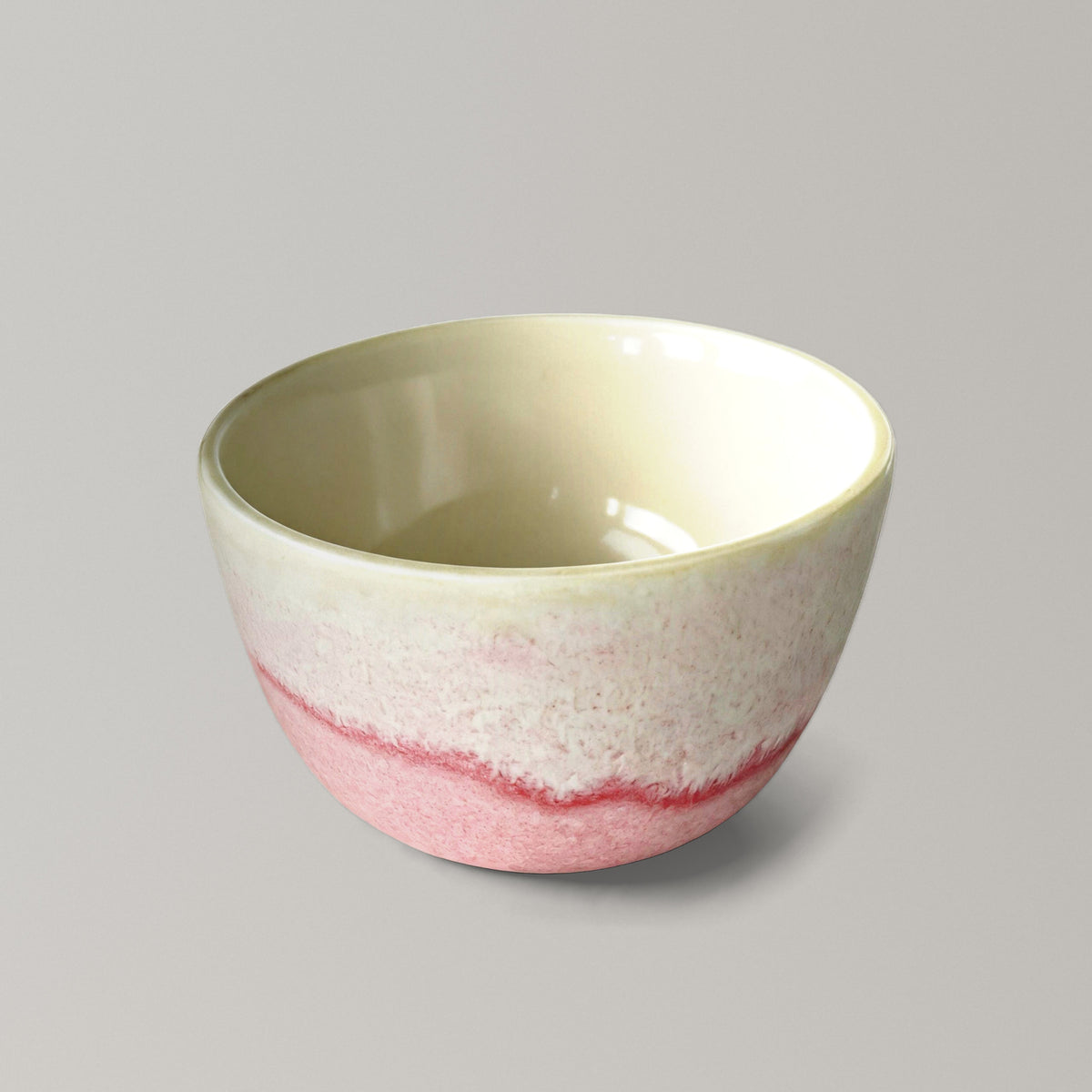 Handmade stoneware cupping bowl, glossy cream interior and pink glaze