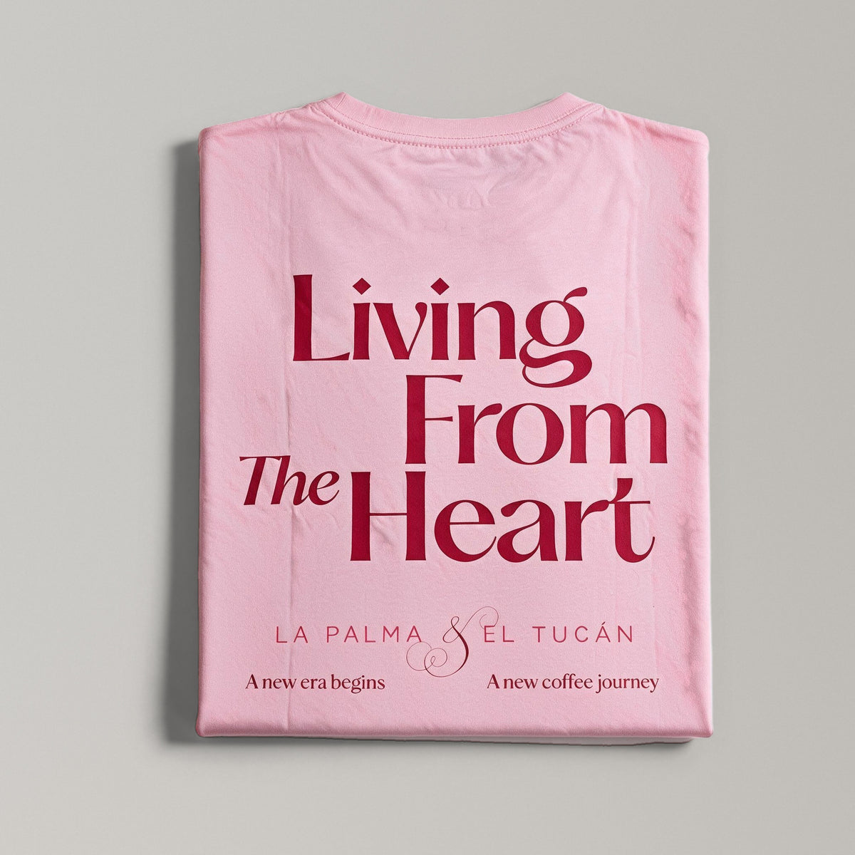La Palma & El Tucán pink T-shirt folded, back print