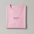 La Palma & El Tucán pink T-shirt folded, front
