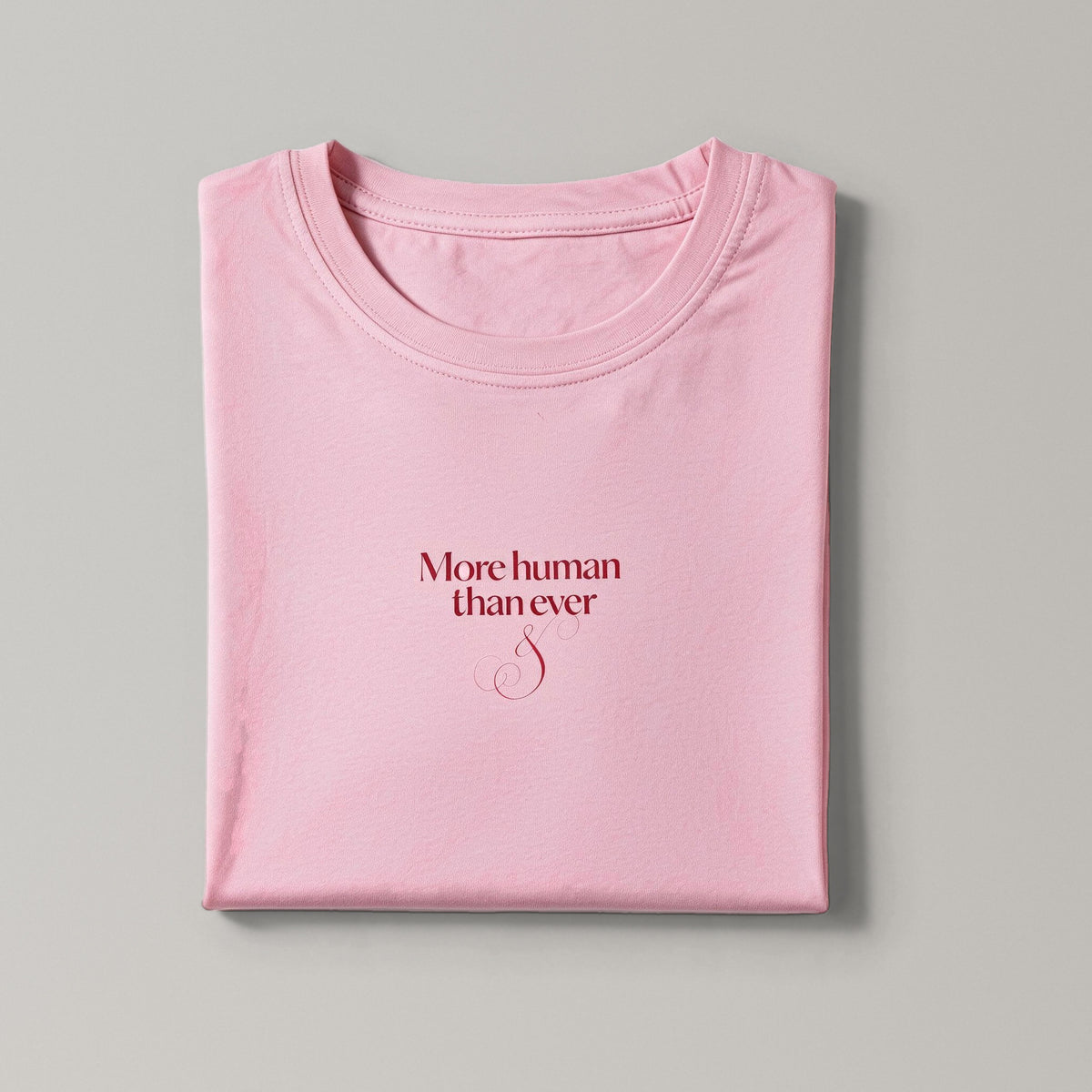 La Palma & El Tucán pink T-shirt folded, front