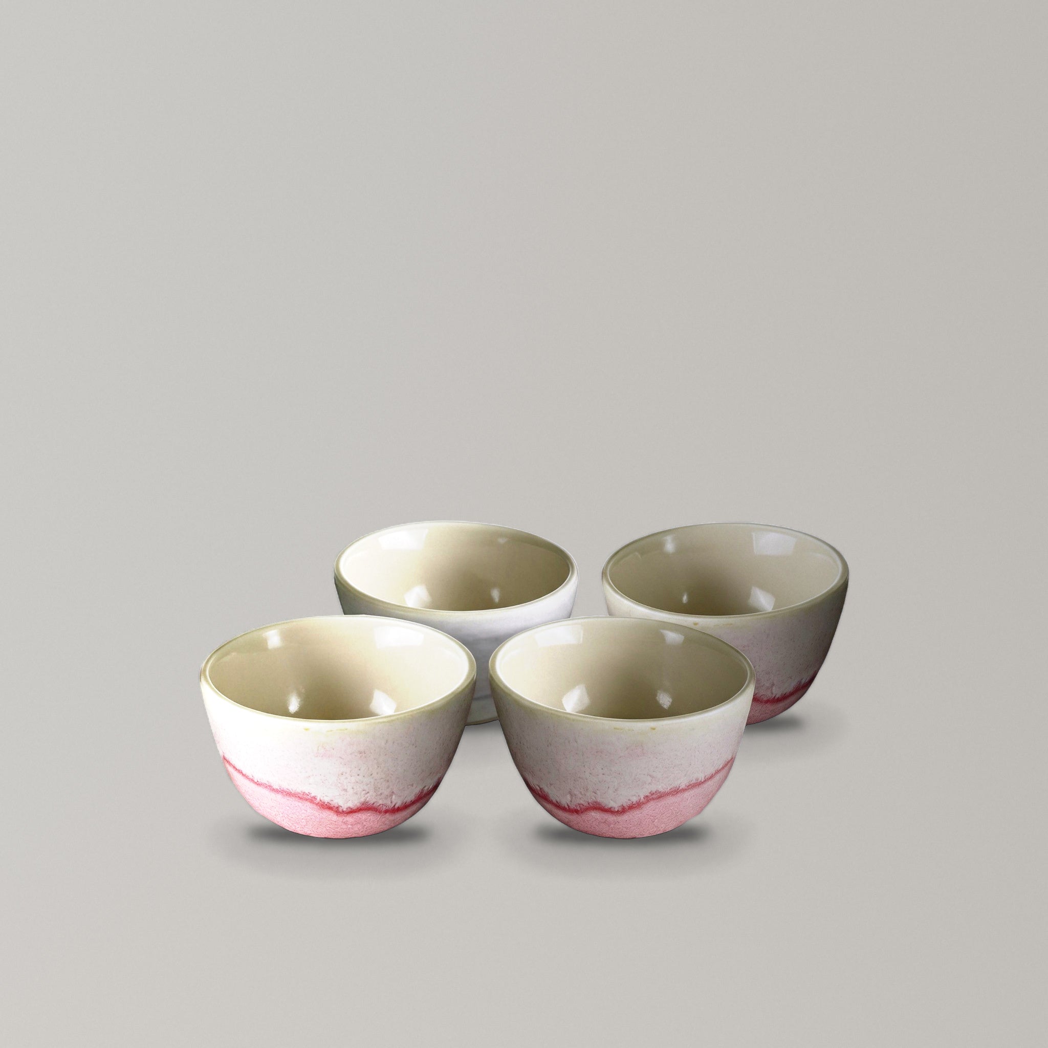 The Cupping Set, four handmade stoneware cupping bowls with cream and pink glaze