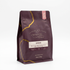 Roasted Geisha coffee bag on white studio background